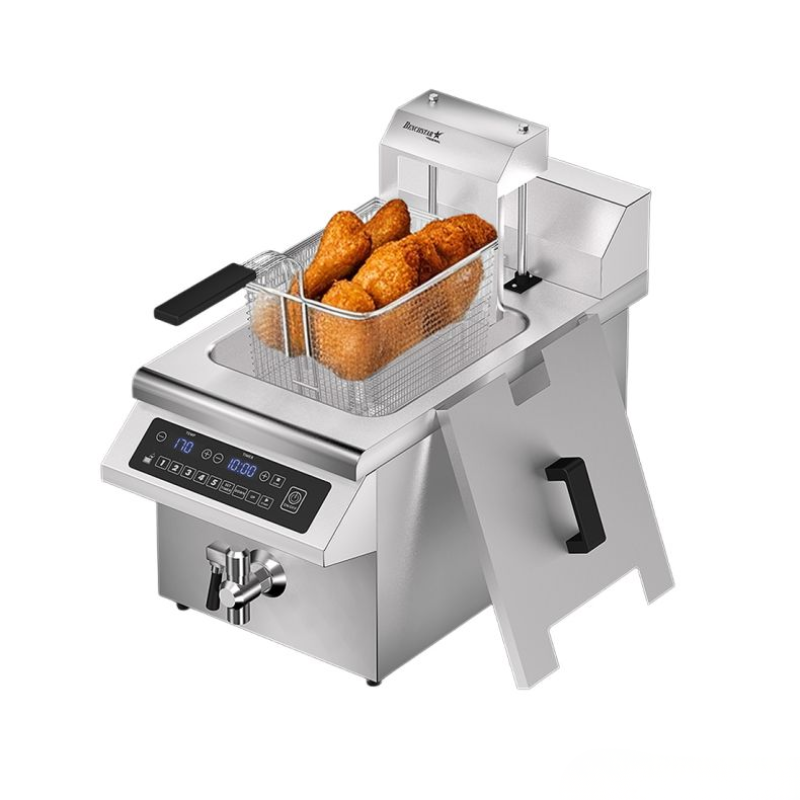 Stainless steel deep fryer with basket of fried food on a white background