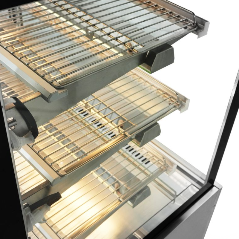 Close-up of a stainless steel grill with multiple grates on a white background