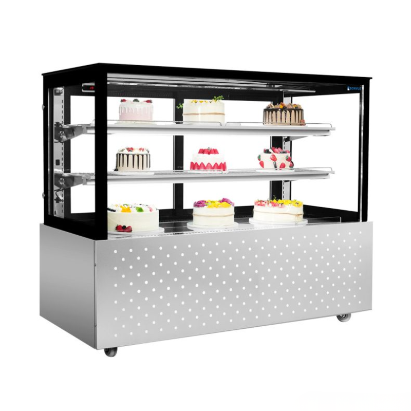 Display case with cakes on a white background