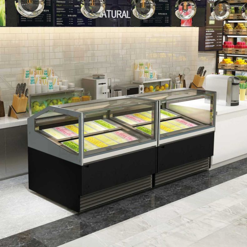 Frozen food display case in a modern kitchen setting with various items on shelves.