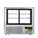 Commercial freezer with glass doors on a white background