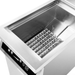Stainless steel deep fryer with hot dogs on a white background