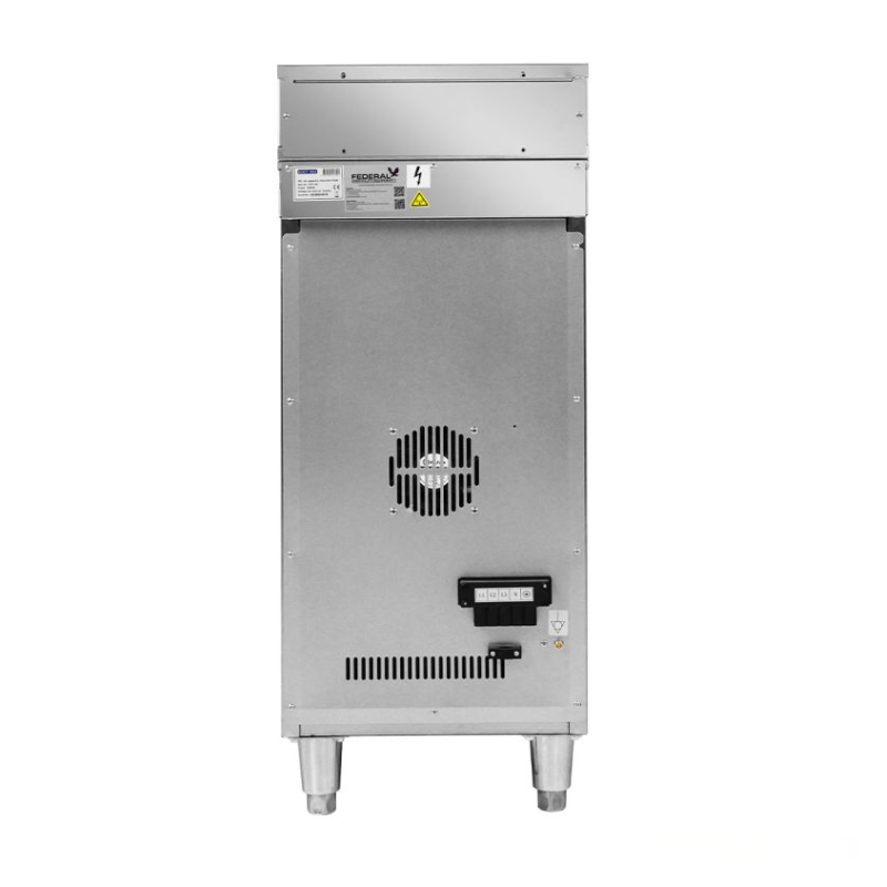 Stainless steel industrial oven on a white background