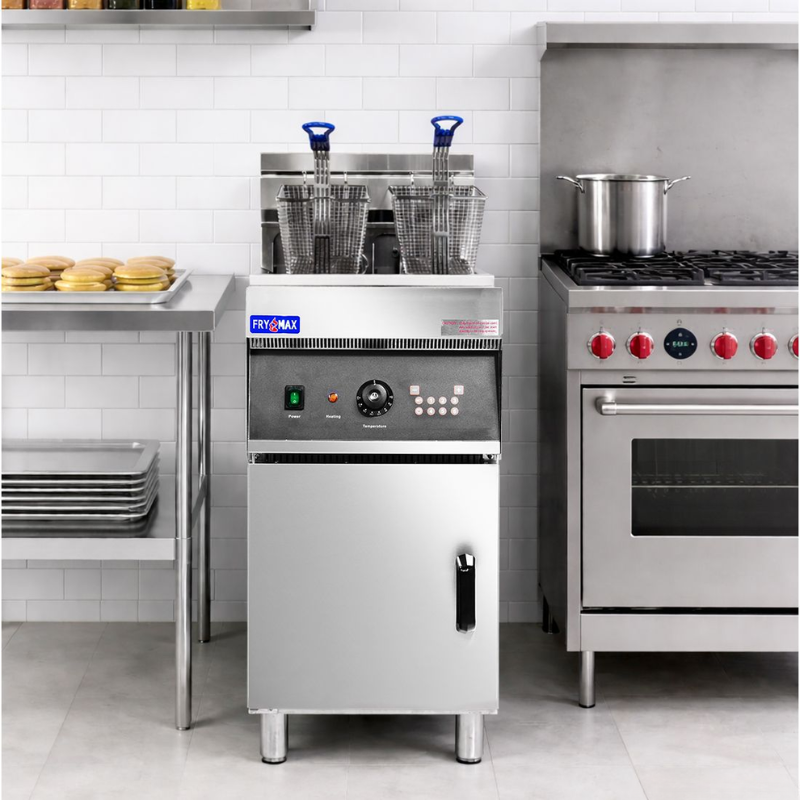 Commercial kitchen equipment including a fryer and oven in a professional kitchen setting.