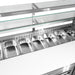 Thermaster SCB/21 top view of the refrigerated pan well filled with stainless steel GN food pans beneath two glass display shelves