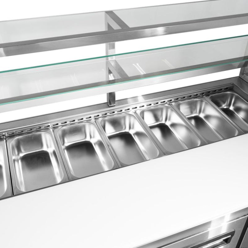 Thermaster SCB/21 top view of the refrigerated pan well filled with stainless steel GN food pans beneath two glass display shelves