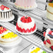 Bonvue SG120FA-2XB close-up of decorated cakes on the wire display shelves
