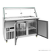 Commercial refrigerator with open doors on a white background