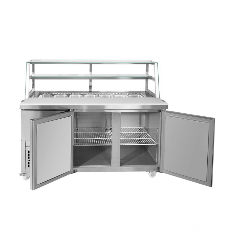Stainless steel prep table with open doors on a white background