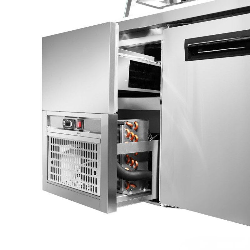 Stainless steel refrigerator with open door showing interior compartments.