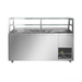 Stainless steel food display case with glass top on a white background