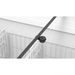 Close-up of a black cylindrical object on a white metal grid structure.
