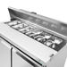 Stainless steel food warmer with multiple compartments on a white background