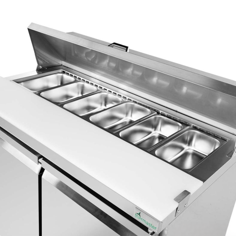 Stainless steel food warmer with multiple compartments on a white background