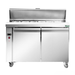 Stainless steel prep table with two doors on a white background