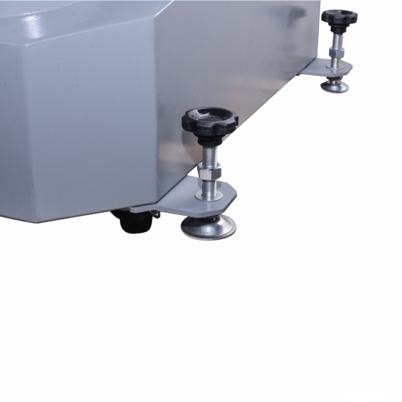 Metallic appliance with adjustable feet on a white background