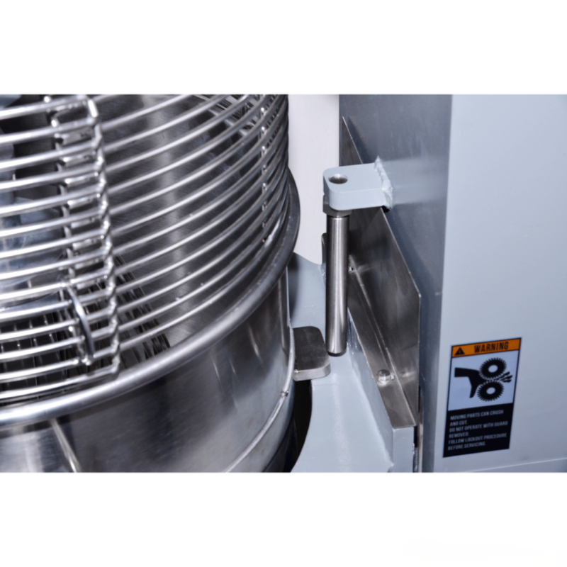 Close-up of a metal spiral mixer with a control panel and label on a white background