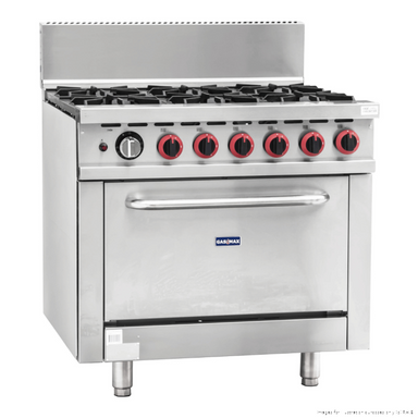 Gasmax GBS6TS 6 burner natural gas range with oven, angled view of the six burners with the oven door closed