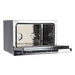 Tecnodom Nerone EKO TDE-3B 600x400 bakery tray convection oven, angled view with the door open to the empty tray racks